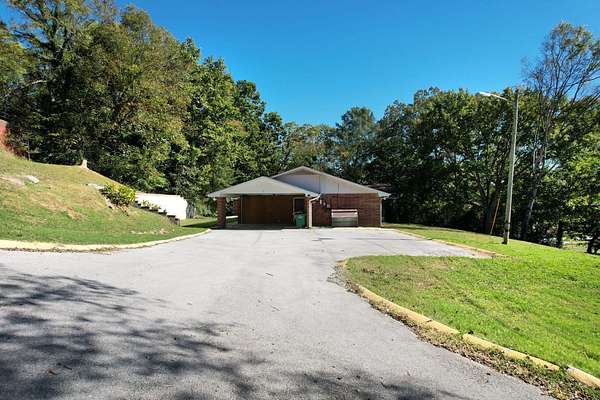 1.5 Acres of Land with Home for Sale in South Pittsburg, Tennessee