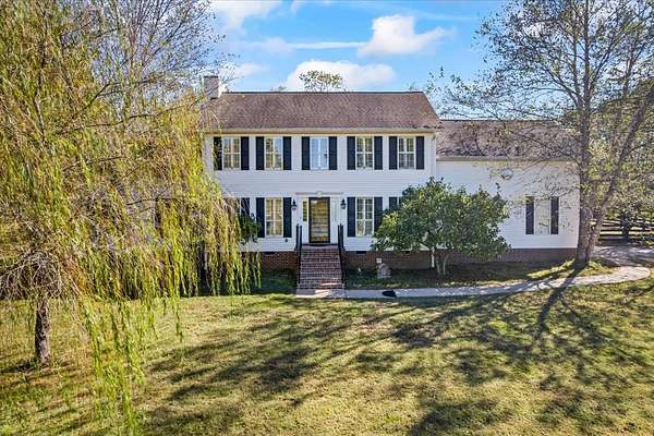 5 Acres of Land with Home for Sale in Castalian Springs, Tennessee