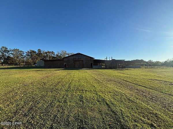 7.74 Acres of Land with Home for Sale in Bonifay, Florida