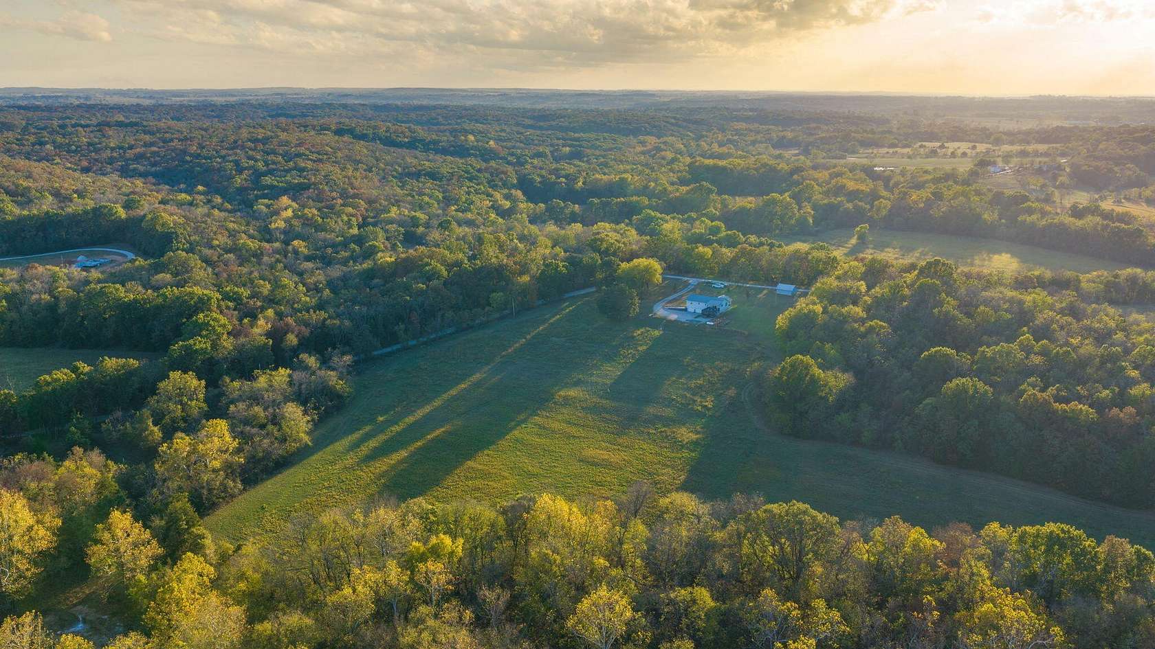85.4 Acres of Recreational Land with Home for Sale in Goodson, Missouri