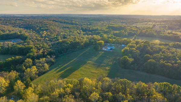 85.4 Acres of Recreational Land with Home for Sale in Goodson, Missouri