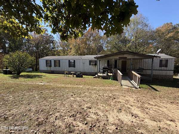 6.6 Acres of Land with Home for Sale in Rockwood, Tennessee