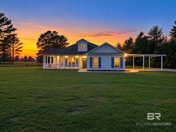 9.86 Acres of Land with Home for Sale in Loxley, Alabama