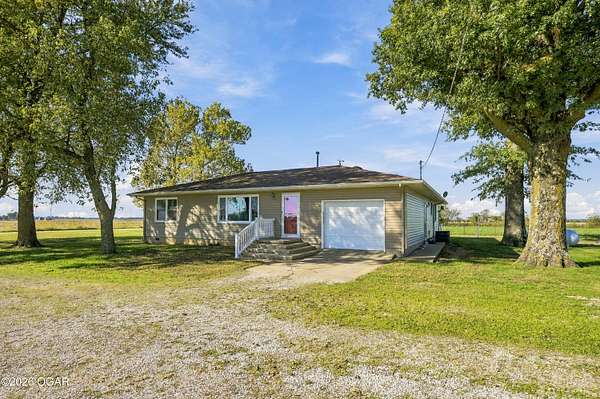 10 Acres of Land with Home for Sale in Liberal, Missouri
