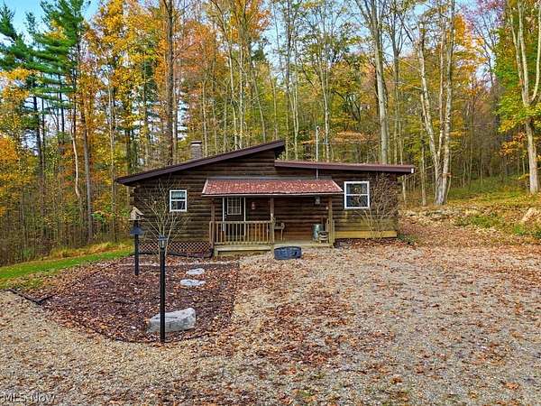 14.3 Acres of Recreational Land with Home for Sale in Carrollton, Ohio