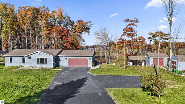 4.88 Acres of Land with Home for Sale in Lake City, Michigan