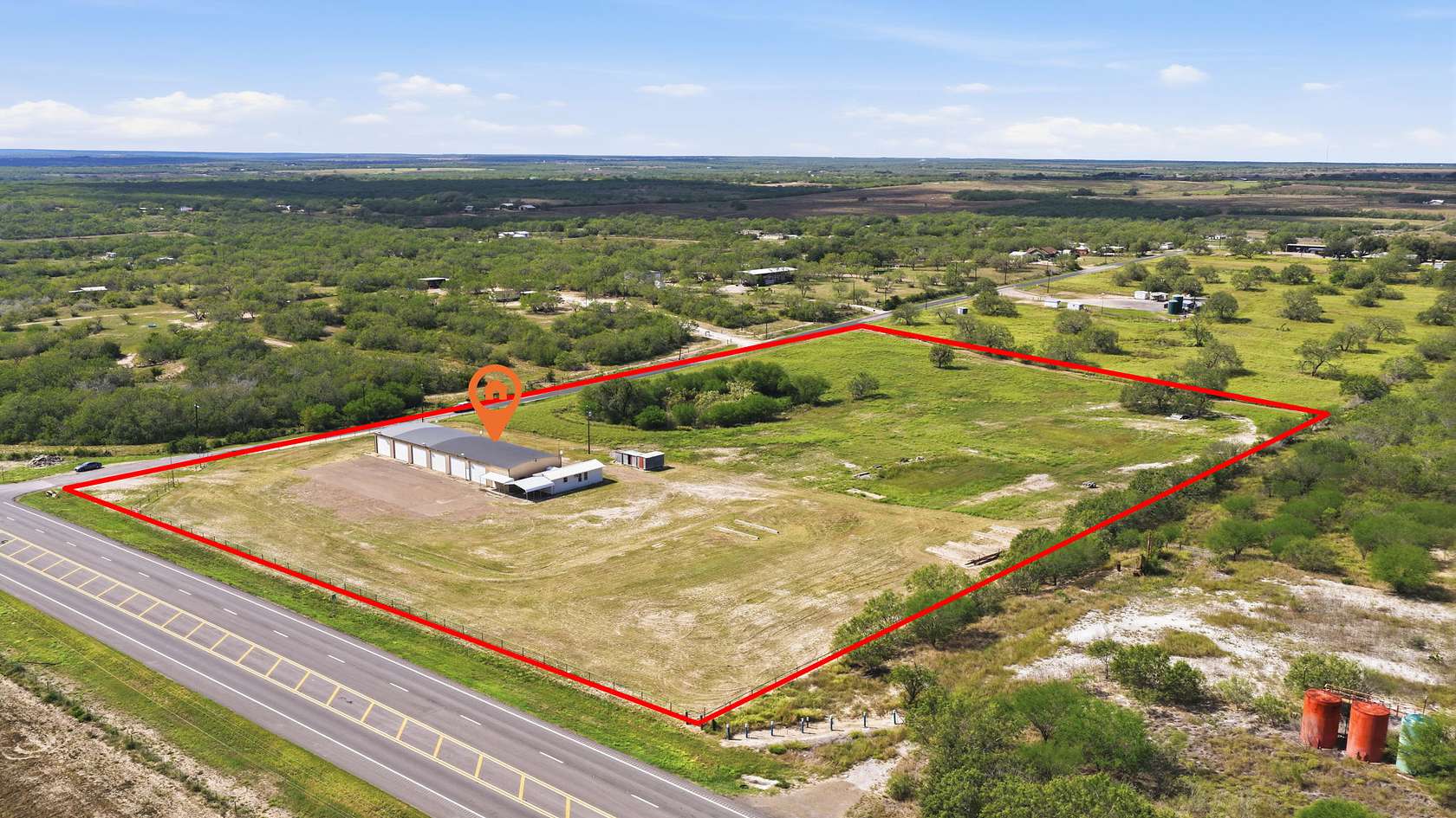 9.5 Acres of Improved Commercial Land for Sale in George West, Texas
