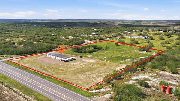 9.5 Acres of Improved Commercial Land for Sale in George West, Texas