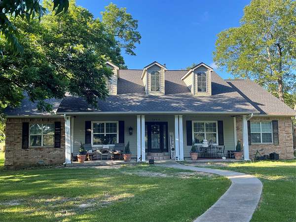 24 Acres of Recreational Land with Home for Sale in Wolfe City, Texas