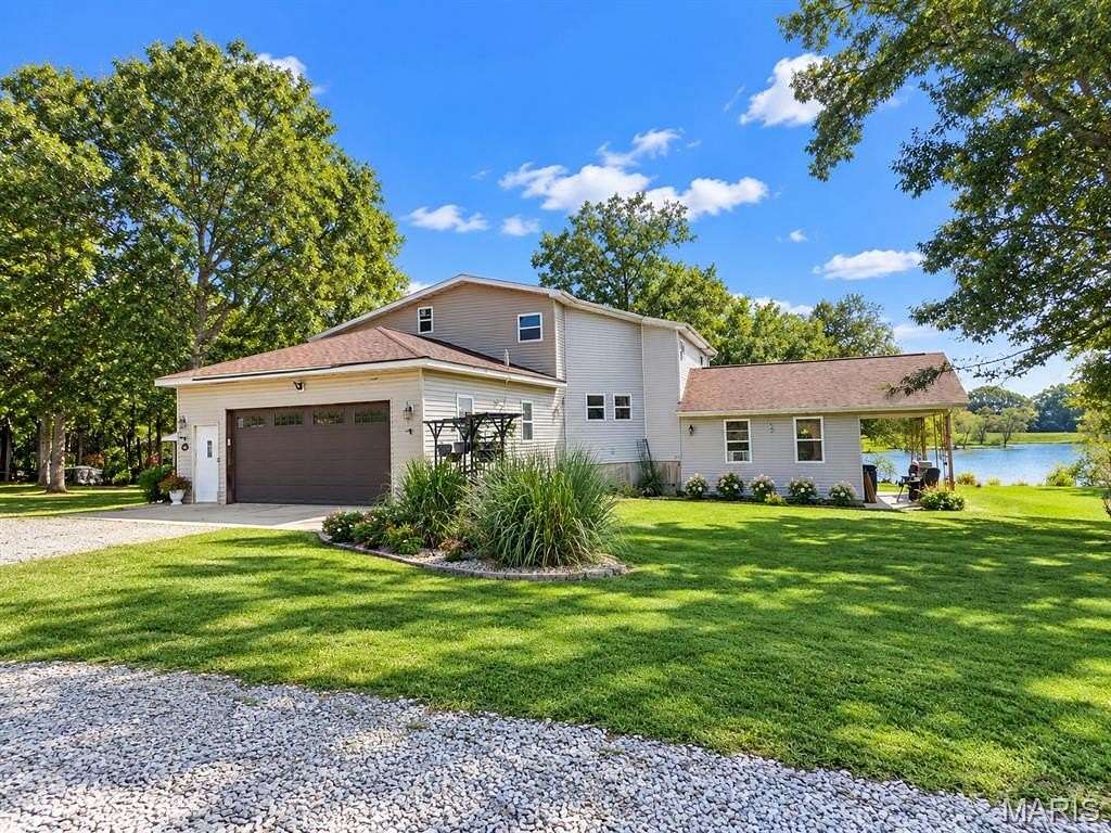 7.64 Acres of Land with Home for Sale in Farmington, Missouri