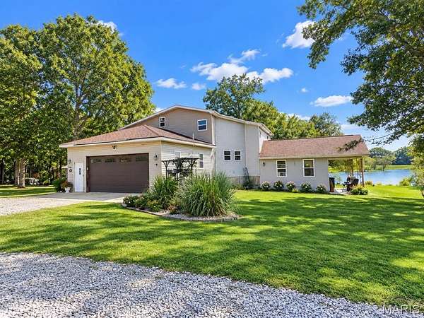 7.64 Acres of Land with Home for Sale in Farmington, Missouri