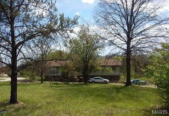 1.6 Acres of Land with Home for Auction in Fulton, Missouri