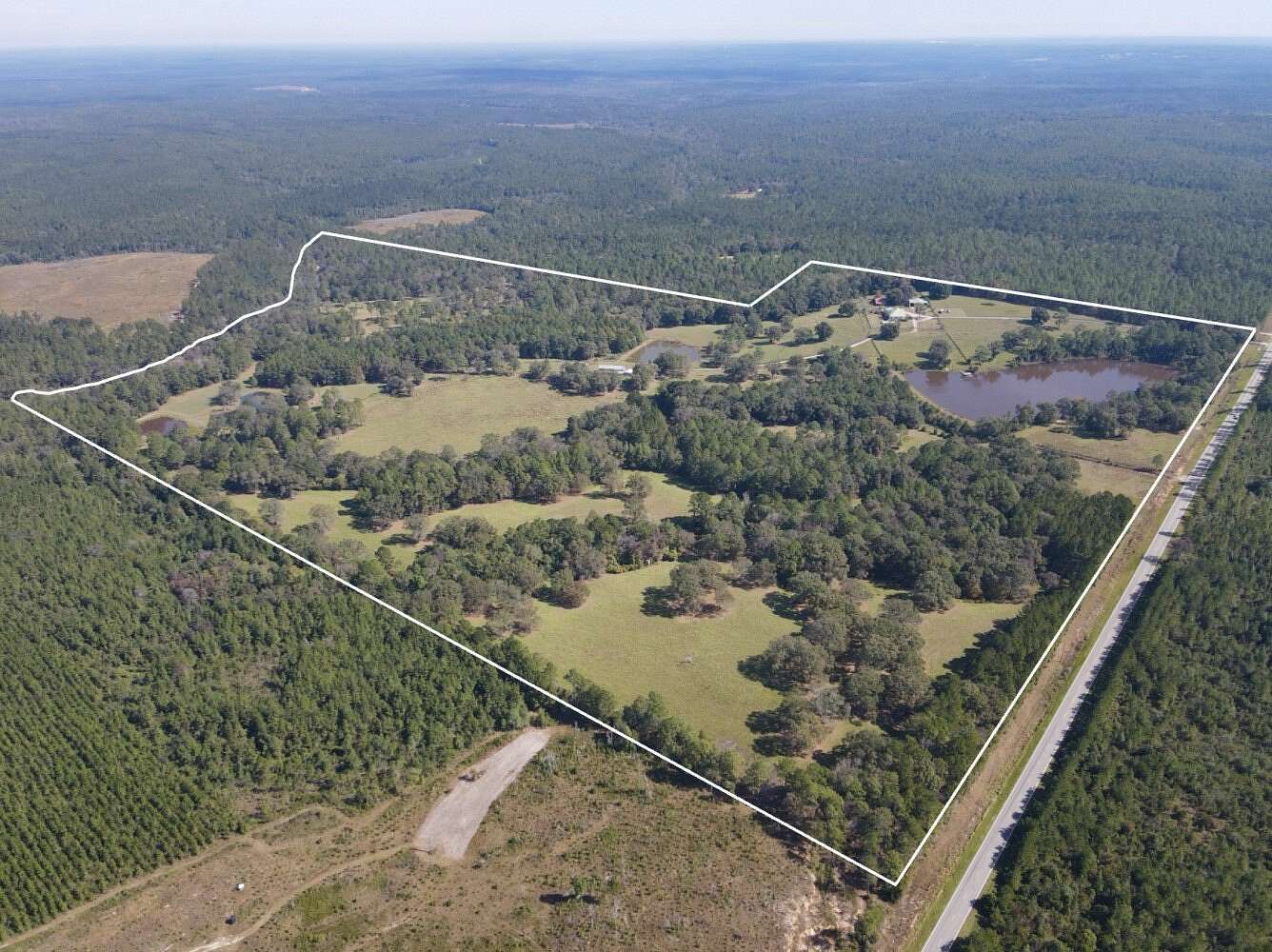 167 Acres of Land with Home for Sale in Citronelle, Alabama