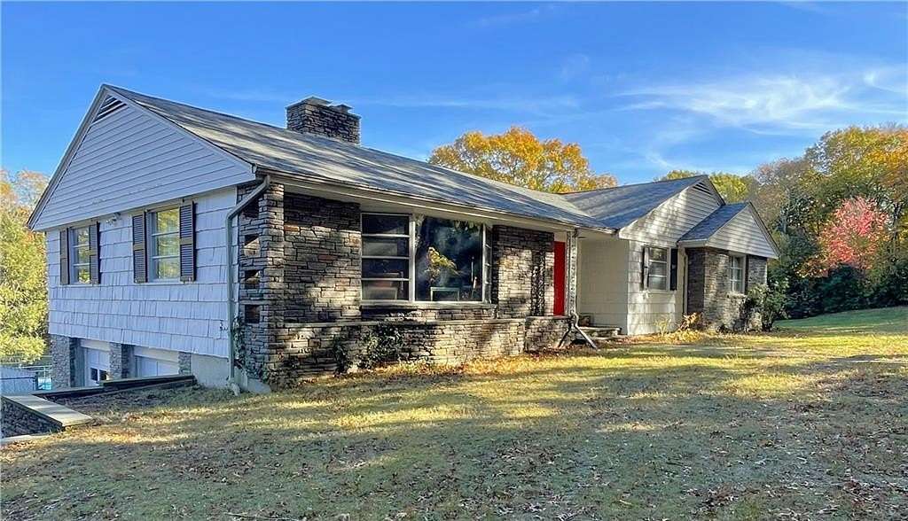 1.5 Acres of Land with Home for Sale in Cumberland, Rhode Island