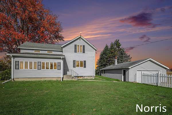2.5 Acres of Land with Home for Sale in Alto, Michigan