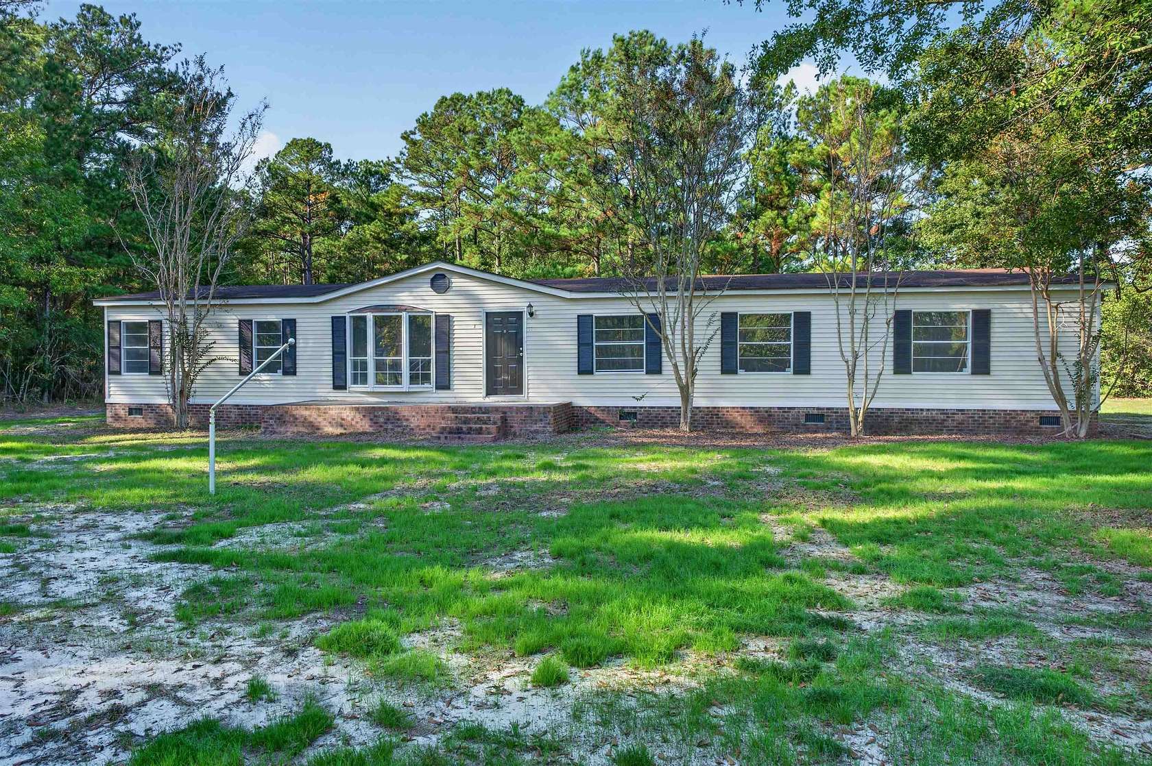 5.8 Acres of Land with Home for Sale in Little River, South Carolina