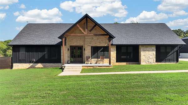 2.5 Acres of Land with Home for Sale in Gravette, Arkansas