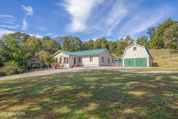 11.1 Acres of Land with Home for Sale in Athens, Tennessee