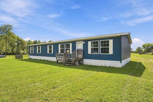 10 Acres of Land with Home for Sale in Crystal, Michigan