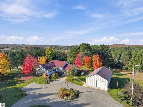 42 Acres of Land with Home for Sale in Manton, Michigan