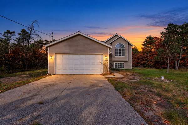 2 Acres of Land with Home for Sale in Howard City, Michigan