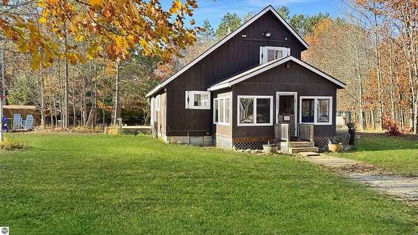 10 Acres of Recreational Land with Home for Sale in Lake City, Michigan