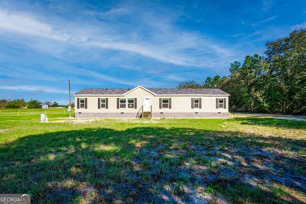 3 Acres of Land with Home for Sale in Saint George, Georgia