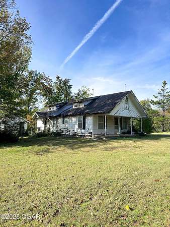 4.4 Acres of Land with Home for Sale in Anderson, Missouri