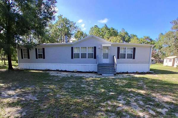 2.65 Acres of Land with Home for Sale in Dunnellon, Florida