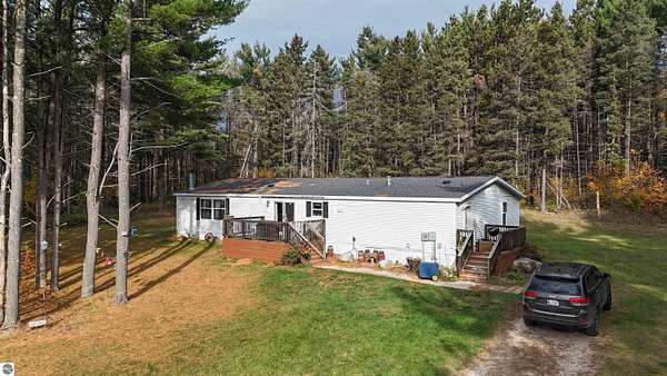 11 Acres of Recreational Land with Home for Sale in McBain, Michigan