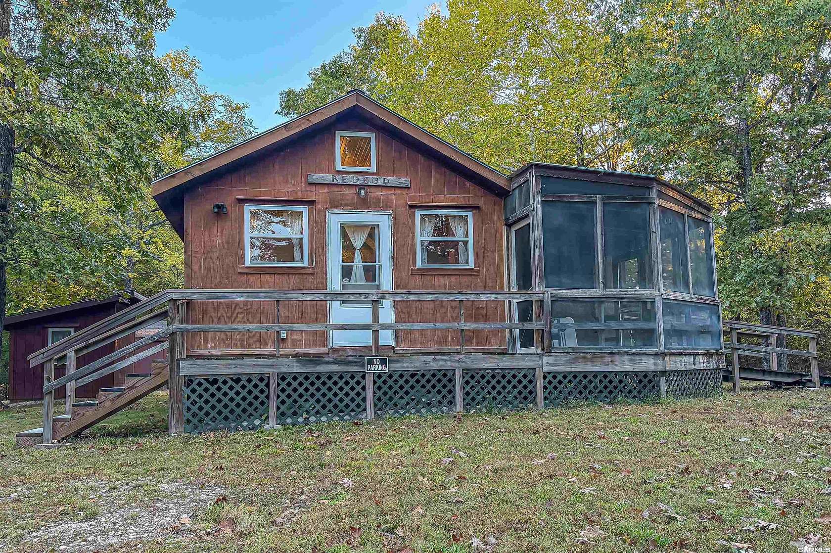 65 Acres of Recreational Land with Home for Sale in Yellville, Arkansas