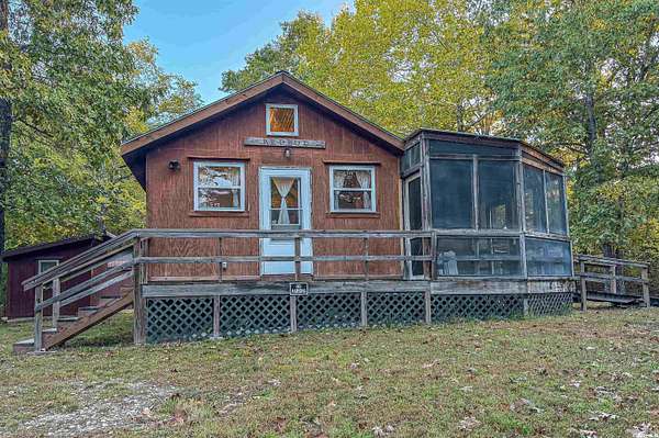 65 Acres of Recreational Land with Home for Sale in Yellville, Arkansas