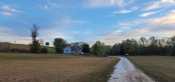 6.3 Acres of Land with Home for Sale in Ozark, Missouri