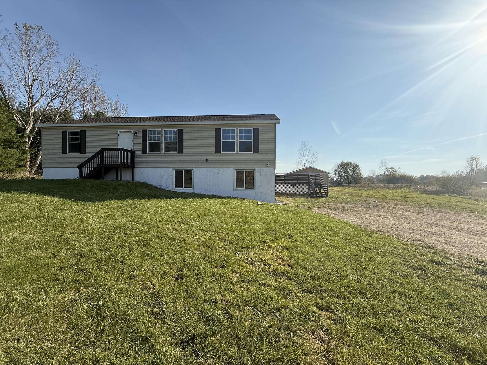 10 Acres of Land with Home for Sale in Charlotte, Michigan