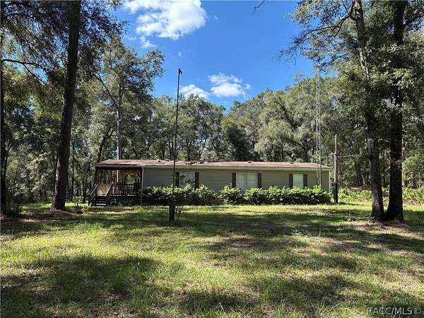 2.43 Acres of Land with Home for Sale in Inverness, Florida