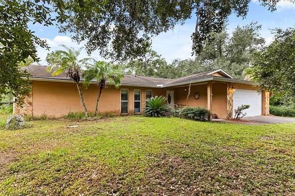 3.58 Acres of Land with Home for Sale in Christmas, Florida