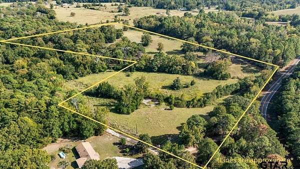 25.4 Acres of Recreational Land with Home for Sale in Winnsboro, Texas