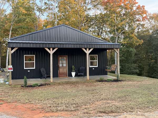 5.66 Acres of Land with Home for Sale in Charlotte, Tennessee