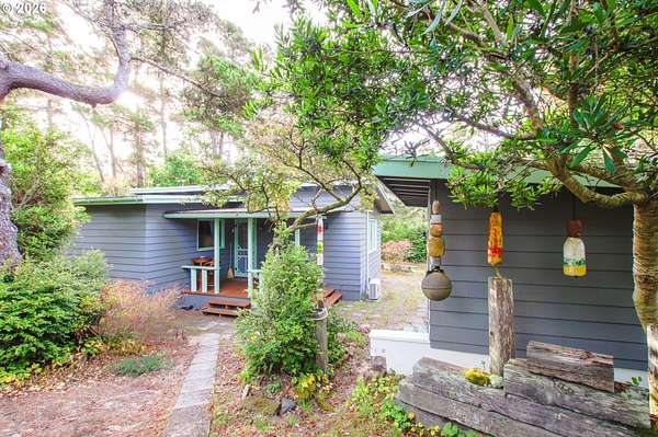 0.59 Acres of Land with Home for Sale in Florence, Oregon