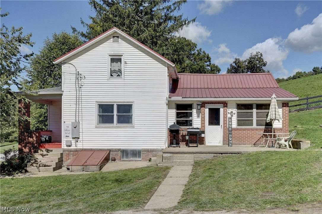 5.1 Acres of Land with Home for Auction in Newcomerstown, Ohio