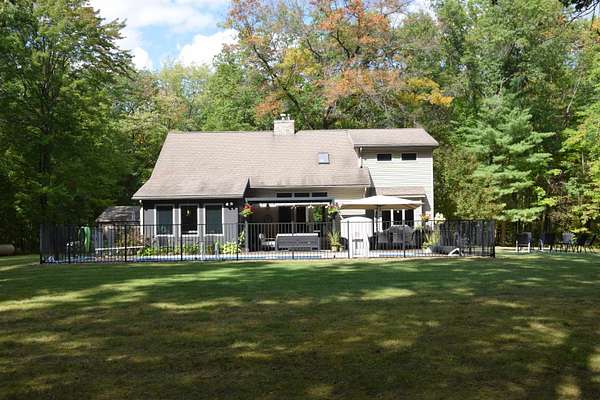 3.86 Acres of Land with Home for Sale in Farwell, Michigan