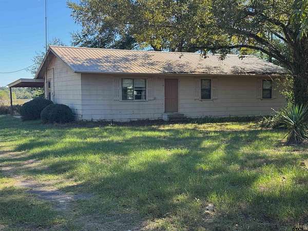 2 Acres of Land with Home for Sale in Scroggins, Texas