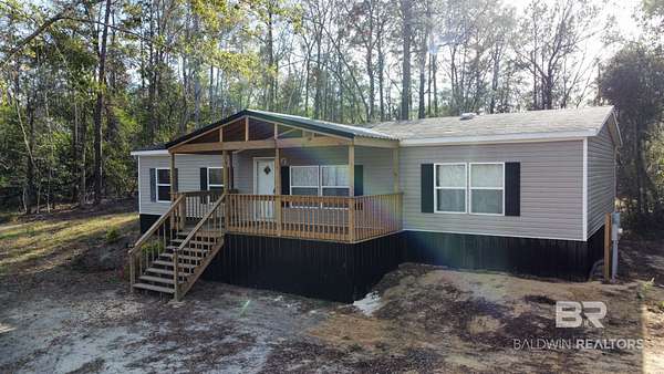 24.2 Acres of Recreational Land with Home for Sale in Brewton, Alabama