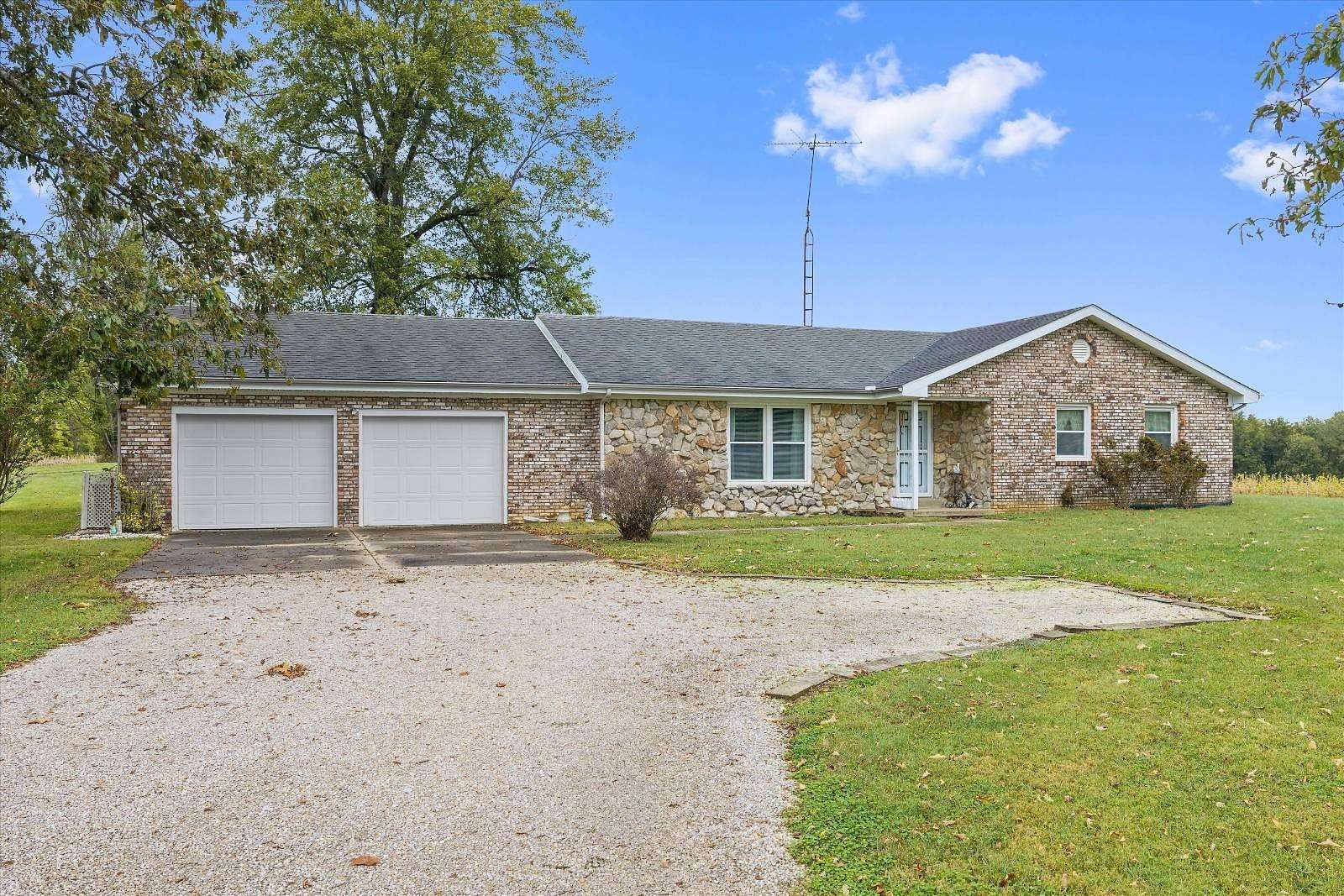 1.79 Acres of Land with Home for Auction in Henderson, Kentucky