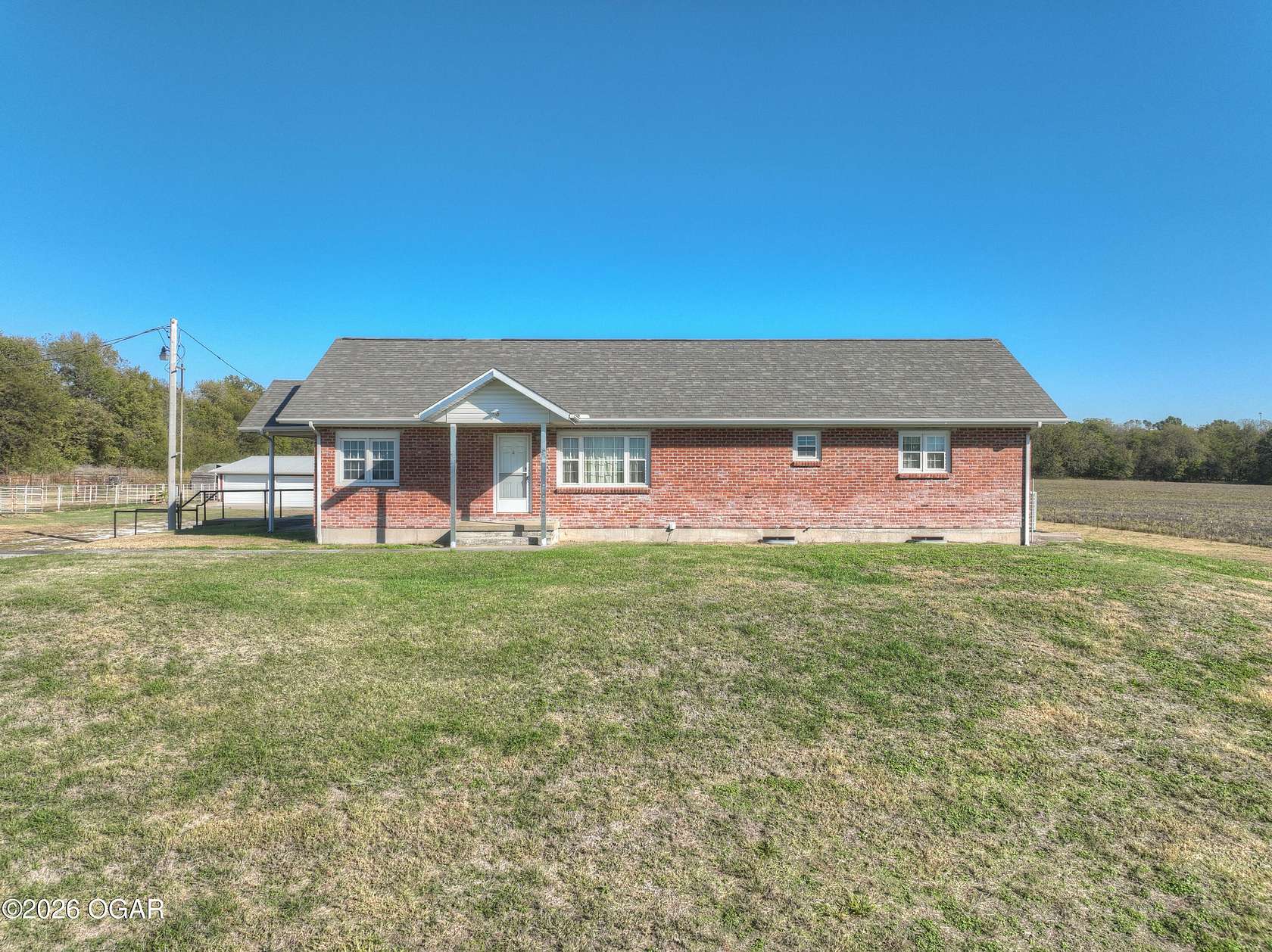 68.9 Acres of Land with Home for Sale in Carthage, Missouri