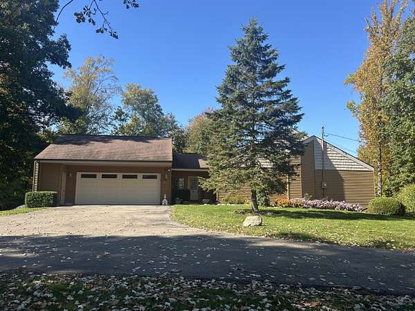 9.8 Acres of Land with Home for Sale in Quincy, Michigan