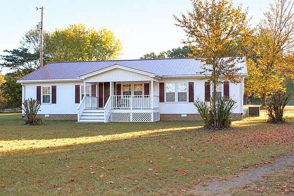 1.85 Acres of Land with Home for Sale in Cottontown, Tennessee
