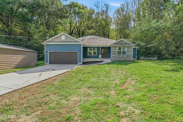 4.82 Acres of Land with Home for Sale in Knoxville, Tennessee