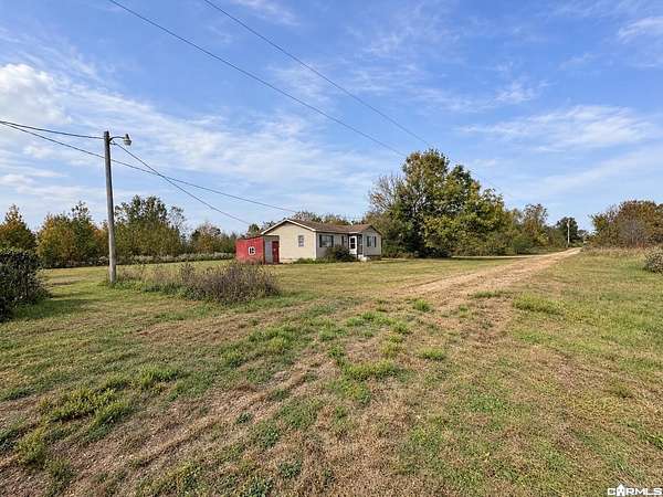 8.84 Acres of Land with Home for Sale in Paragould, Arkansas