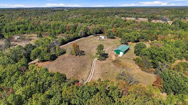 20 Acres of Land with Home for Sale in Raymondville, Missouri